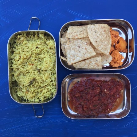 Spanish rice, home made chips and salsa, and paprika biscuits
